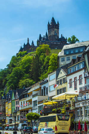 COCHEM, GERMANY - MAY 23 2019: View of the picturesque town Cochem with its famous imperial castle on top of the hill. Cochem is located at Moselle river in Rhineland-Palatinate, Germany.のeditorial素材