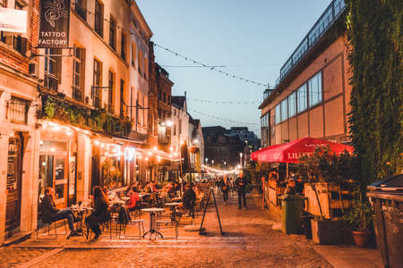Brussels, BELGIUM - October 8, 2021: Nightlife in Brussels.. People enjoying the evening in the streets of Belgiums capitalのeditorial素材