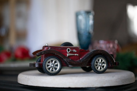 small wooden model of an old retro carの写真素材