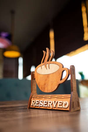 Reserved sign on table in modern restaurant.の写真素材