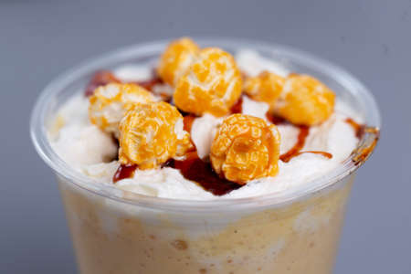 childish sweet cocktail with popcorn close up.の写真素材
