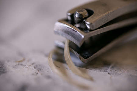 Remnants of a human nails cut off using a nail clipperの写真素材
