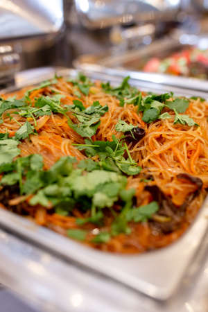 spicy carrot with mushrooms and parsley with spices.