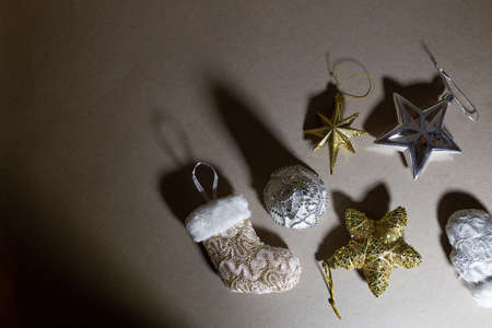 christmas toys on a ocher paper background.の写真素材