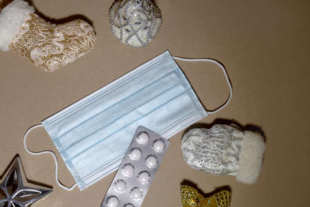 medical mask and Christmas toys on the background.の写真素材