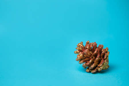 christmas tree toy pine cones on a blue backgroundの写真素材