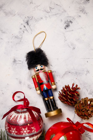 new Year's background. Christmas tree toys and nutcracker top view.