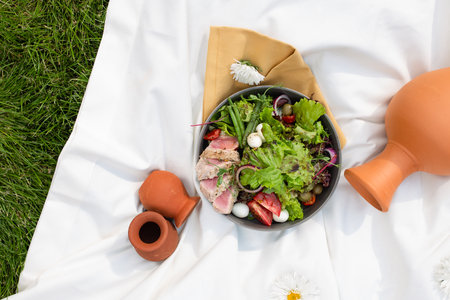 salad with tuna and quail eggs top viewの写真素材