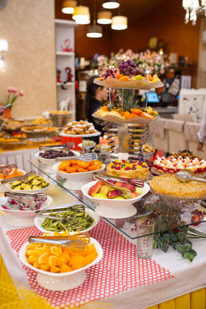 fruits and desserts in the buffet restaurant.の写真素材