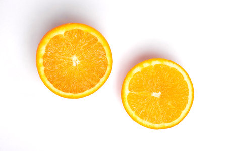 orange slices close-up on a white background.の写真素材