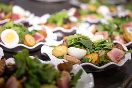 salad with egg, tuna and lettuce leaves.の写真素材