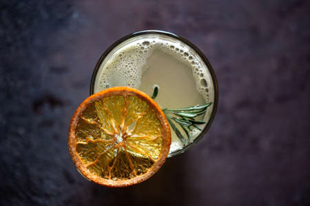 top view a cup of lemon ginger tea with honey.の写真素材