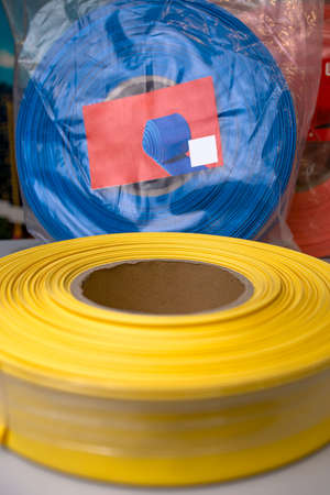 yellow rubber insulation for electrical wires in a roll.