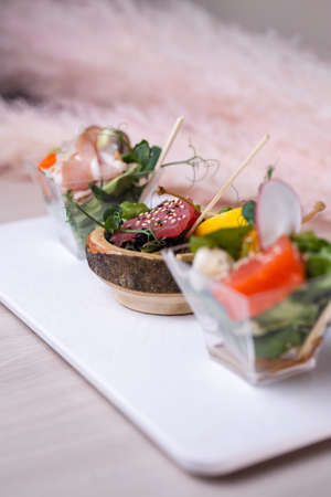 Bruschetta with different sensations on a white plate