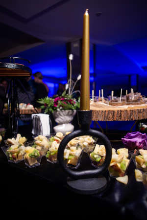 fruit canape in a glass on the buffet table.