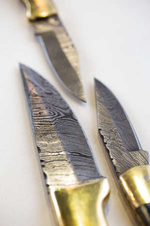 the edge of knives. handmade steel knives.の写真素材