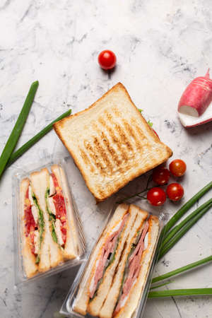 classic sandwich with chicken and fresh vegetables food photo.の写真素材