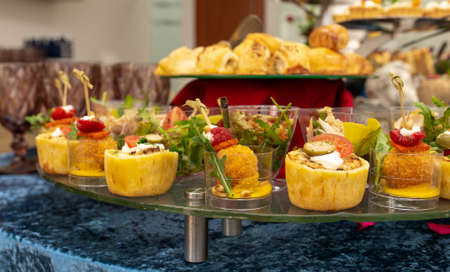 snacks and salads on the buffet table. catering at the eventの写真素材