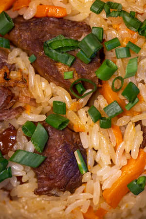rice pilaf dish with meat photo close-up