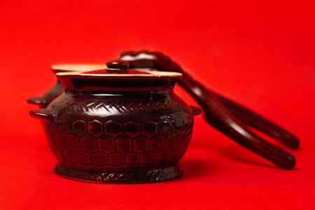 clay dishes for baking in the oven on a red background.の写真素材