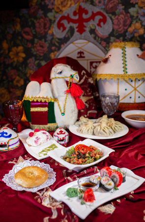 Traditional Kazakh cuisine. view from above. a family table of different dishes for the holiday.の写真素材