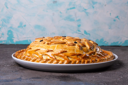hot homemade pie with chicken and potatoes