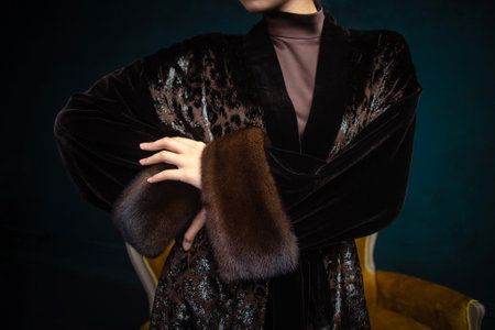 a girl in a fur outfit. sleeves made of natural fur.の写真素材