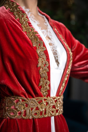 a girl in a red national Kazakh outfit on Nauryz.の写真素材