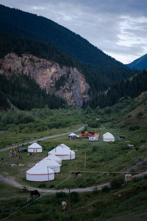 modern Kazakh tourism in the style of a nomadic lifestyle in yurts near the mountains.の写真素材