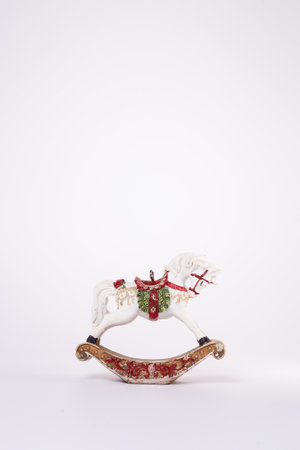 new year retro toy horse on a white background.の写真素材