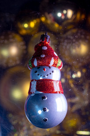 Snowman, Christmas tree ornaments on New Years Day from close-upsの写真素材
