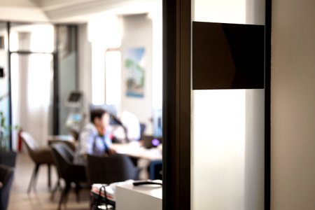 Office interior with glass door and frosted panel