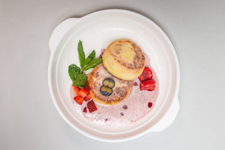 Delicious cottage cheese pancakes made with healthy ingredients, rich in protein and calcium, perfect for a nutritious breakfast option.の写真素材