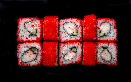 Photo for the menu. Japanese rolls with red caviar top view.の写真素材