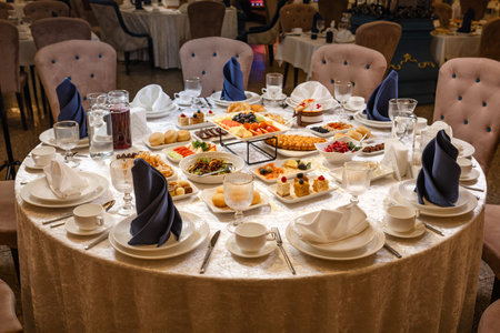 Kazakh national dastarkhan top view with traditional dishes and decor.