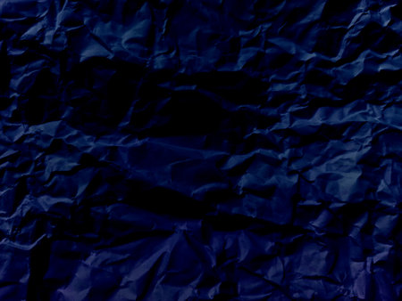 Blue crumpled paper background, crumpled paper texture.の写真素材