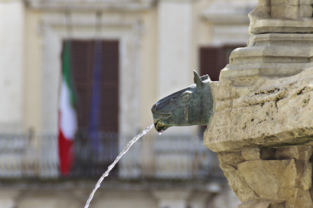 Spout With The head of an animal, in Fontana Maggiori, Perugia, Italyの写真素材