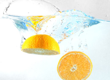 Orange falls into the waterの写真素材