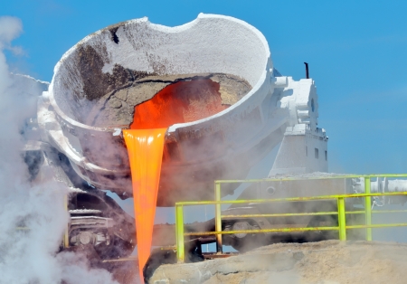 Steel buckets to transport the molten metal inside of plantの写真素材