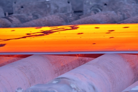 hot steel on conveyor, macroの写真素材