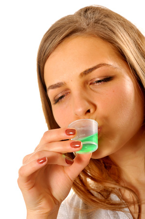 young woman taking drugs close upのeditorial素材