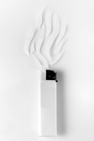white lighter and abstract smoke on white backgroundの写真素材