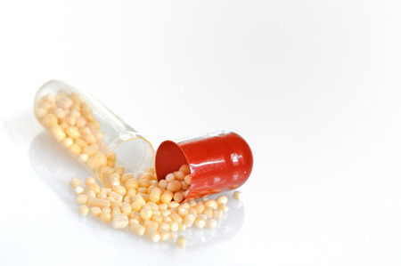 Loose capsule pill on white backgroundの写真素材