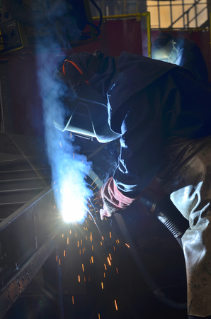 welder welding with mig-mag methodの写真素材