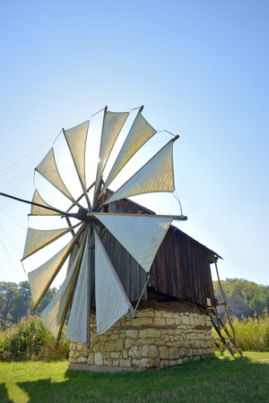 Old wooden wind millの写真素材