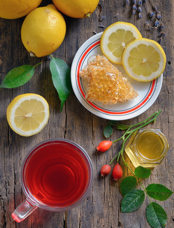 Rosehip tea with lemon and honeyの写真素材