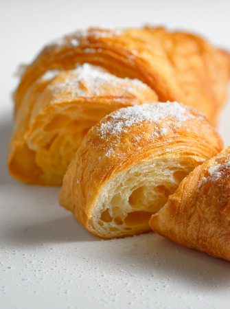 Sliced fresh and tasty croissantの写真素材