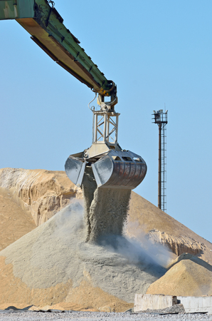 Excavator working on industrial construction siteの写真素材