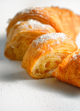 Sliced fresh and tasty croissantの写真素材