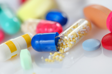Assorted colored pills and capsulesの写真素材